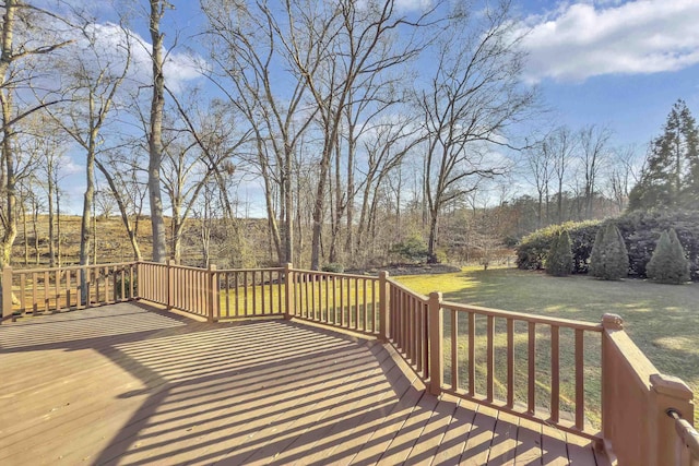 wooden deck with a yard