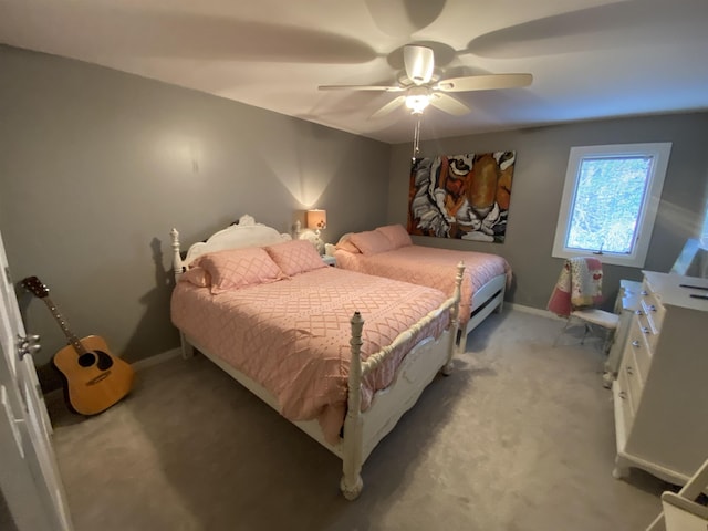 bedroom with light colored carpet and ceiling fan