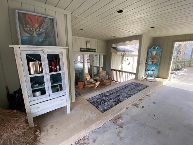 interior space featuring wood ceiling and plenty of natural light