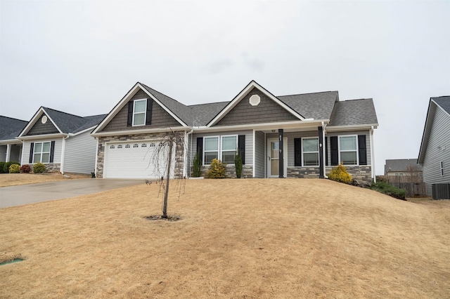 craftsman inspired home with a garage