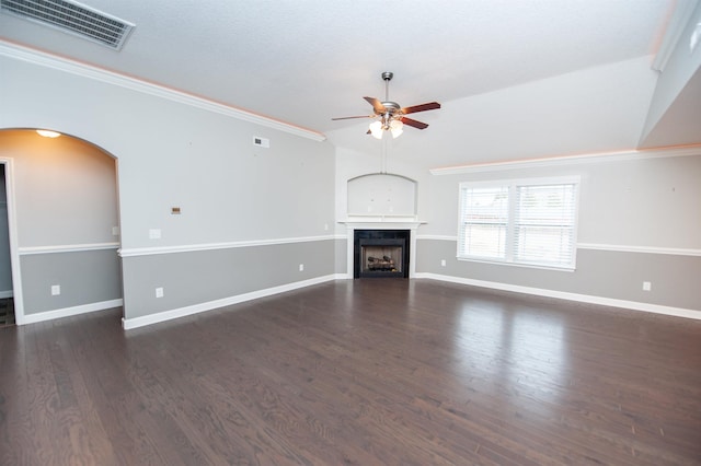 unfurnished living room featuring ceiling fan, ornamental molding, dark hardwood / wood-style floors, and a textured ceiling