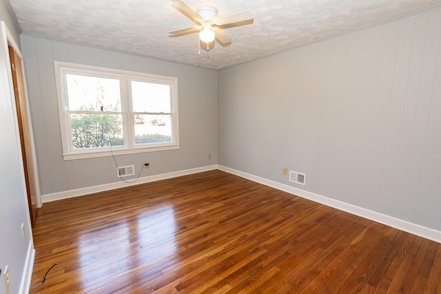 unfurnished room featuring hardwood / wood-style flooring, a textured ceiling, and ceiling fan