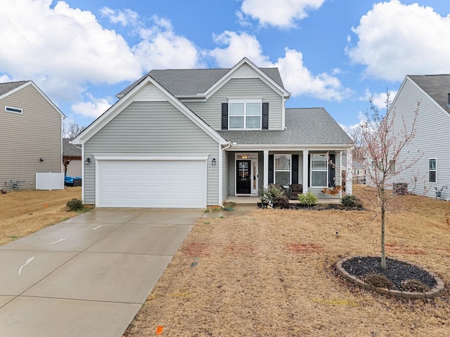 view of front of house with a porch and a garage