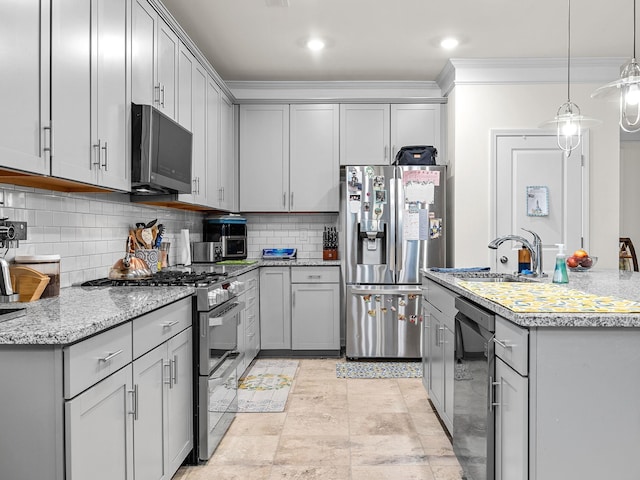 kitchen with gray cabinets, sink, backsplash, stainless steel appliances, and crown molding