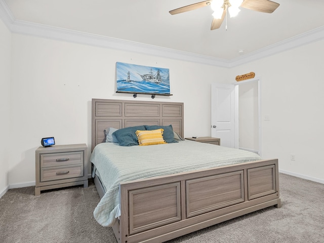 bedroom featuring ceiling fan, ornamental molding, and light carpet