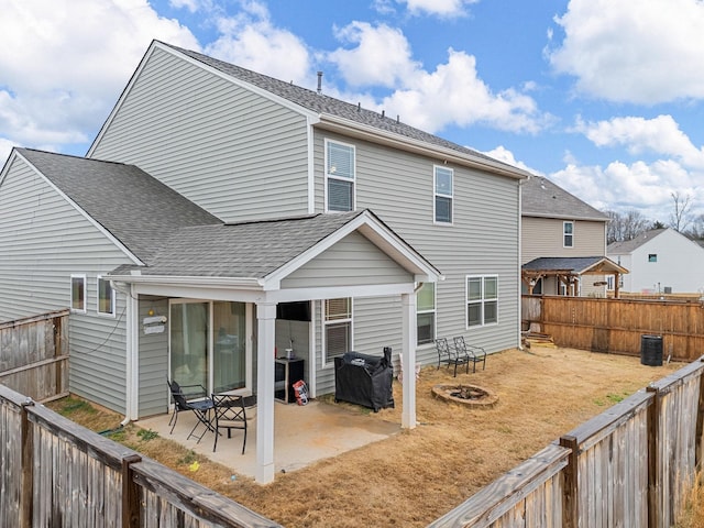 rear view of property with a patio area