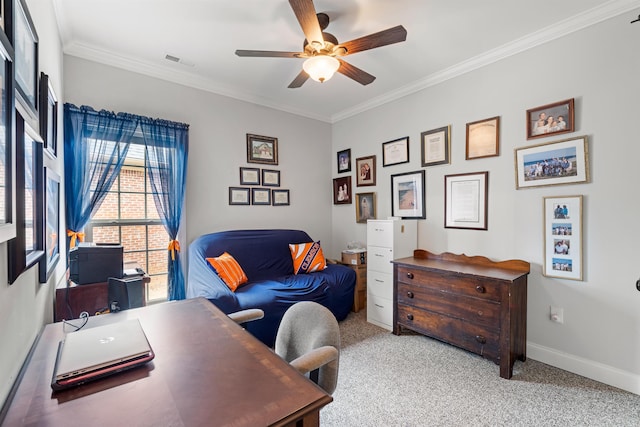 carpeted office with crown molding and ceiling fan