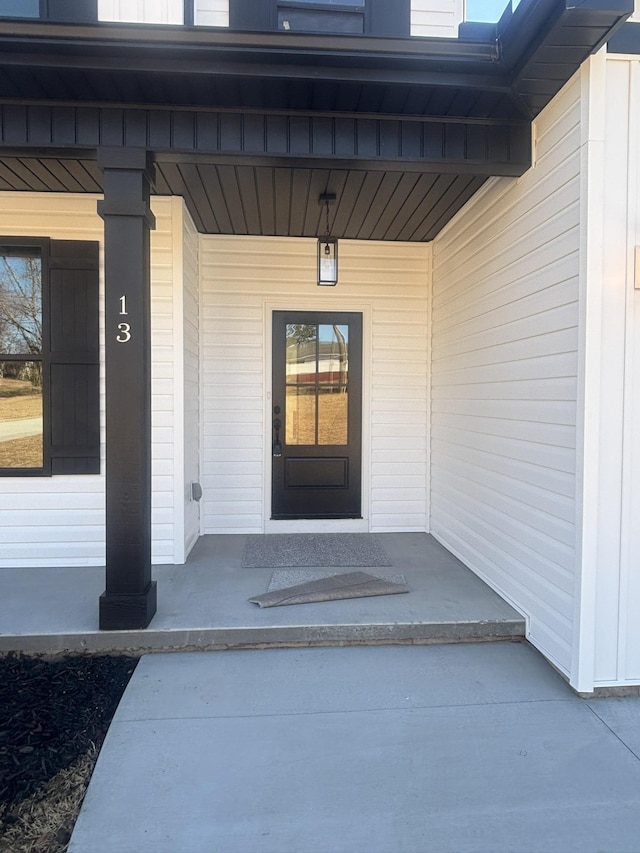 entrance to property with covered porch