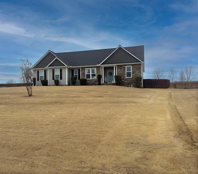 ranch-style house with a front yard