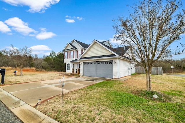 view of front facade with a garage and a front lawn