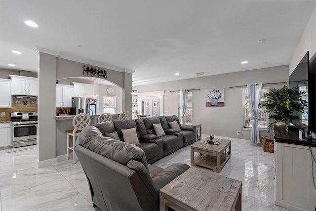 living room with crown molding