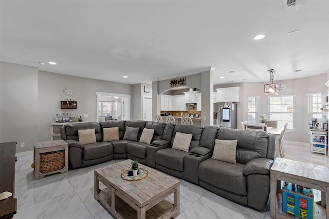 living room featuring a healthy amount of sunlight