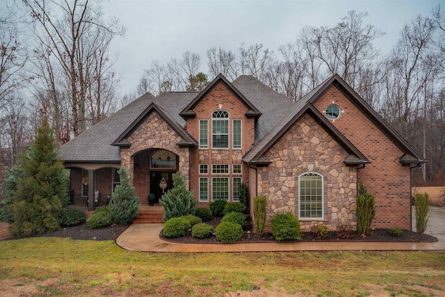 view of front of property with a front lawn