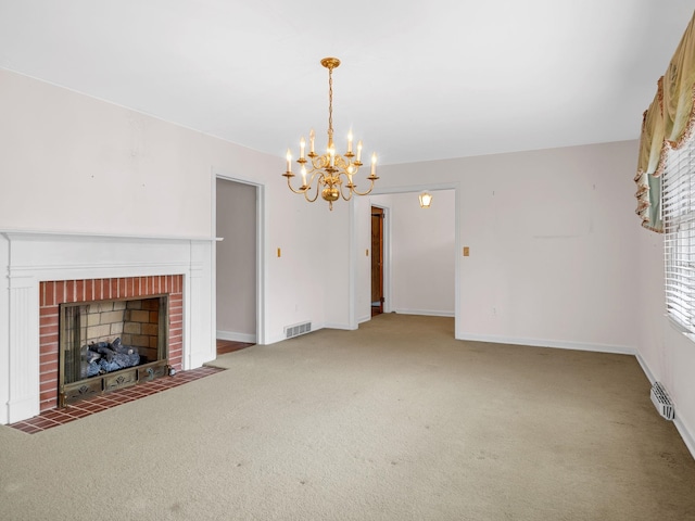 unfurnished living room featuring carpet floors, a chandelier, and a fireplace