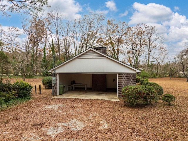 view of home's exterior featuring a carport