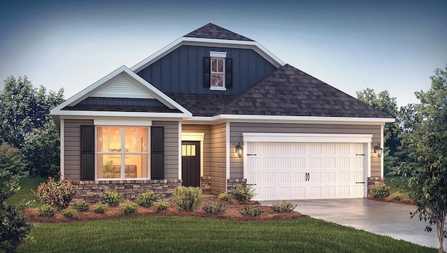 craftsman house featuring a garage and a front lawn