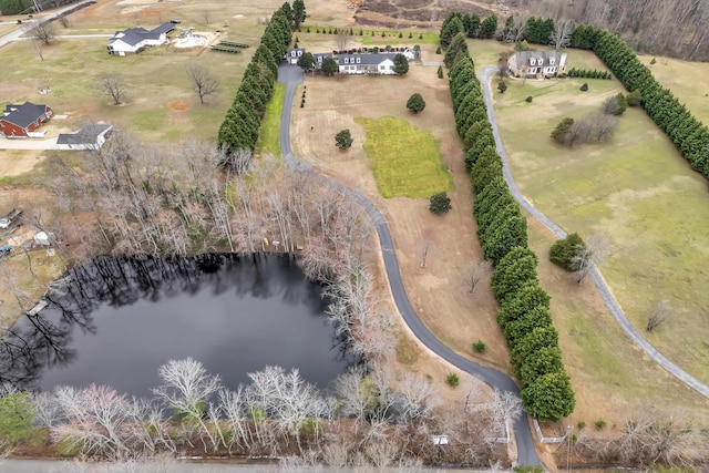 aerial view featuring a rural view and a water view