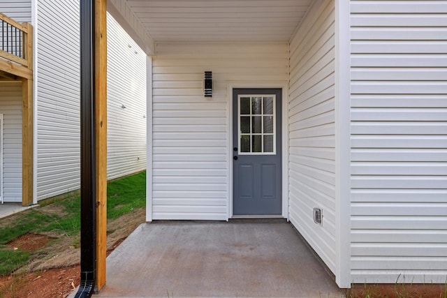 doorway to property featuring a patio