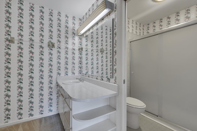 bathroom featuring toilet and sink