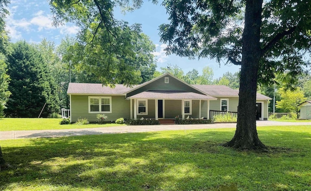 ranch-style home with covered porch and a front lawn