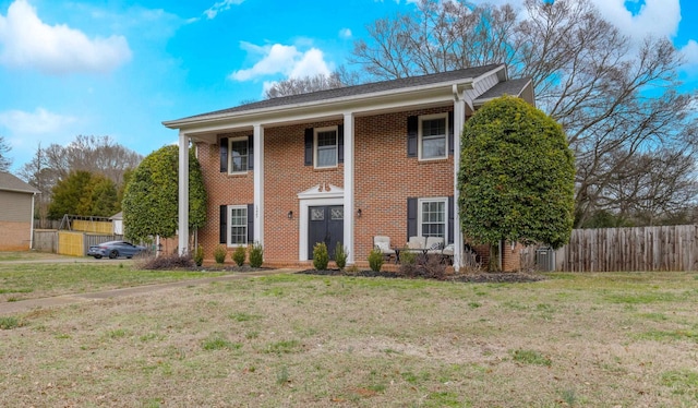 view of front facade with a front lawn