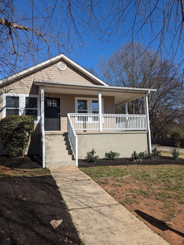 bungalow-style house featuring covered porch