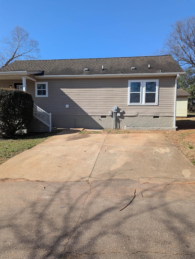 rear view of property with a patio area