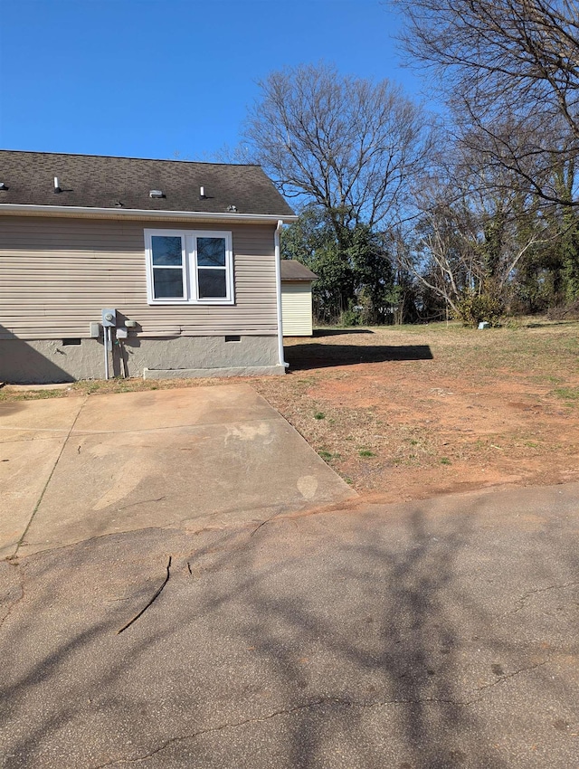 view of home's exterior featuring a garage