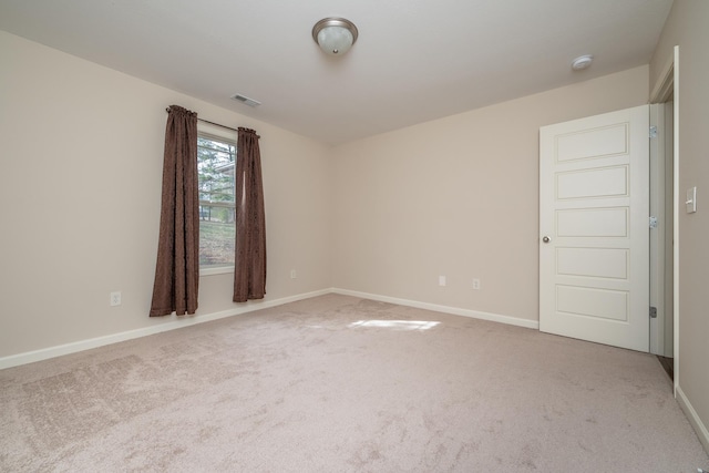 spare room with carpet flooring