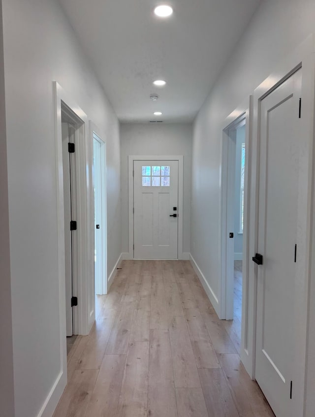 doorway featuring light wood-type flooring