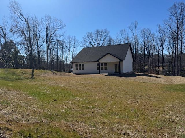 view of front of home with a front yard