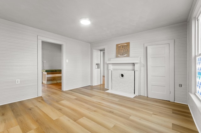 unfurnished living room featuring light hardwood / wood-style flooring