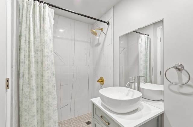 bathroom with vanity and a shower with shower curtain