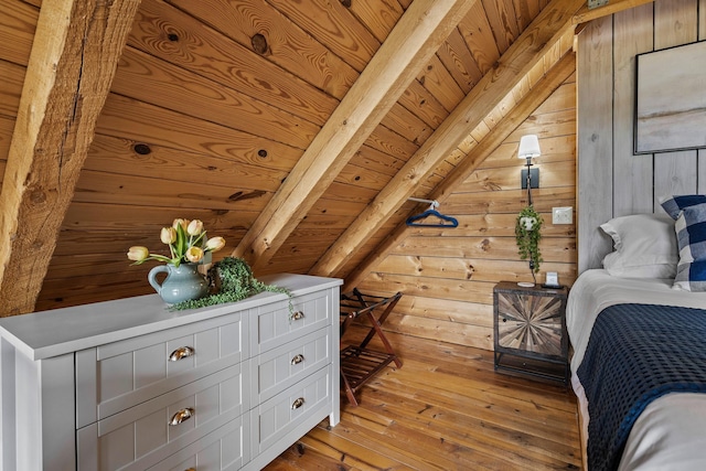 bedroom featuring wood ceiling, wooden walls, lofted ceiling with beams, and light wood-type flooring