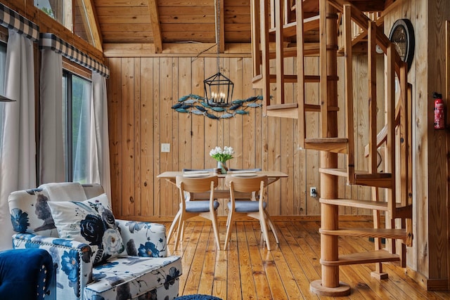 miscellaneous room featuring vaulted ceiling with beams, wooden ceiling, wood-type flooring, and wood walls