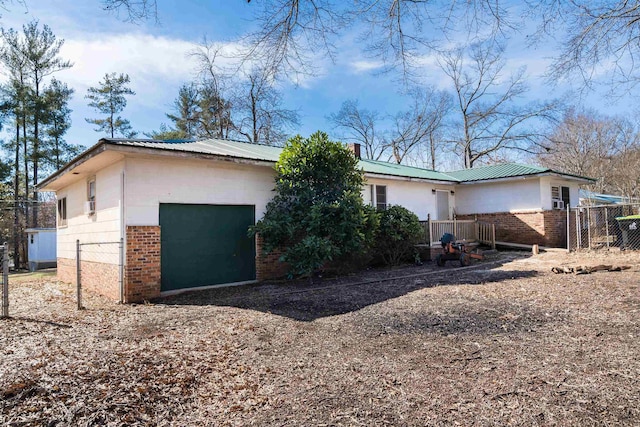 exterior space with a garage