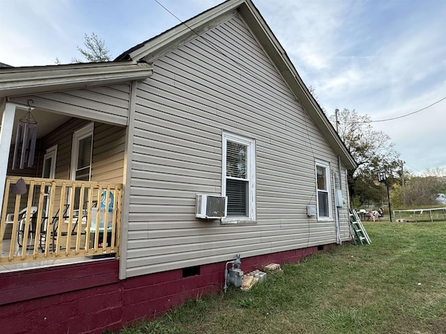 view of home's exterior featuring a lawn