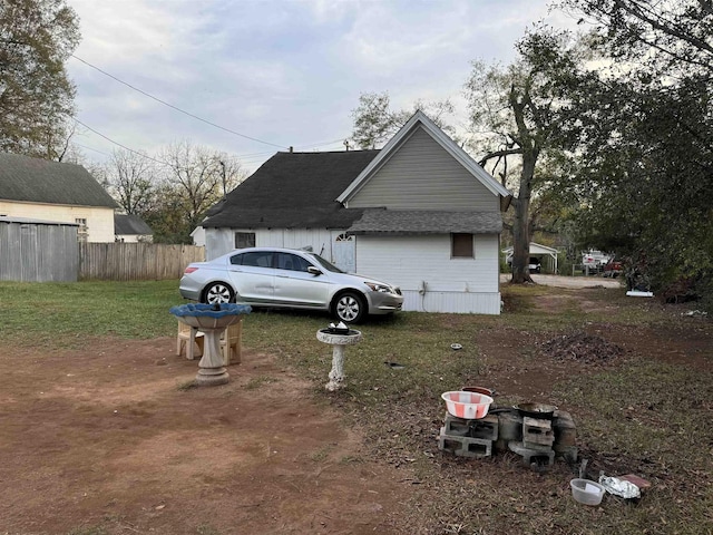 view of home's exterior featuring a lawn