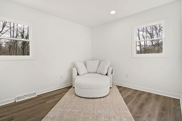 living area featuring dark hardwood / wood-style floors