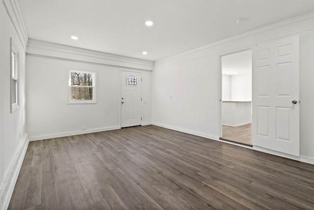 unfurnished room with dark wood-type flooring