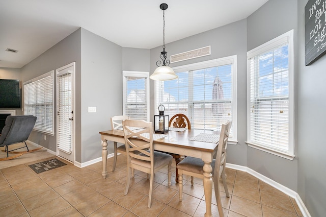 view of tiled dining space