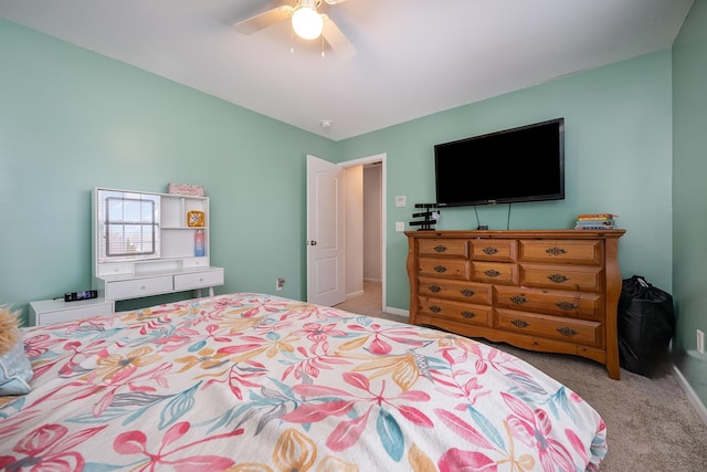 carpeted bedroom with ceiling fan and lofted ceiling