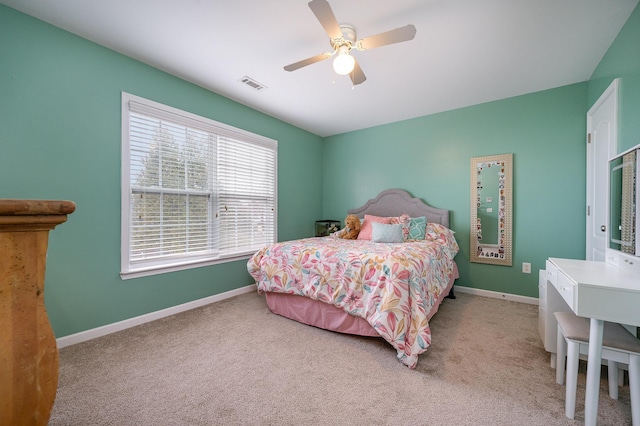 carpeted bedroom featuring ceiling fan