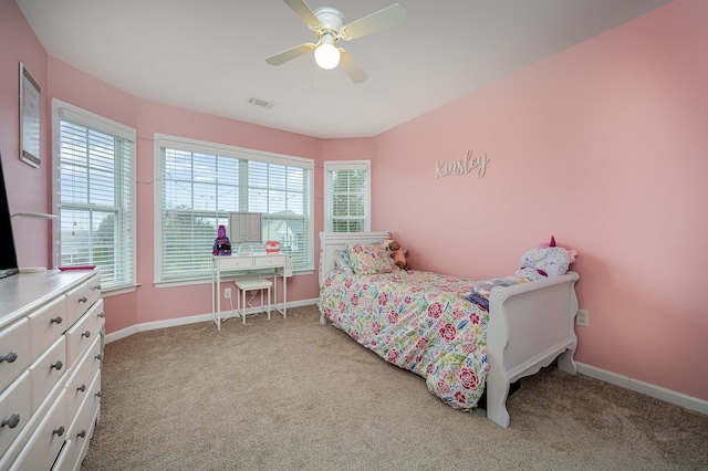 carpeted bedroom featuring ceiling fan