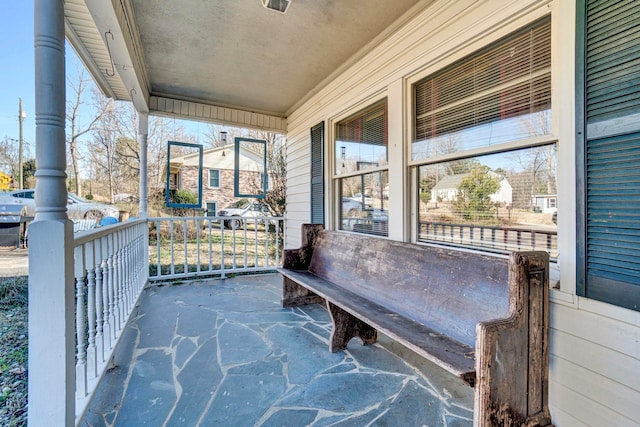 balcony featuring a porch