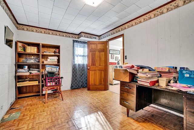 home office with light parquet flooring