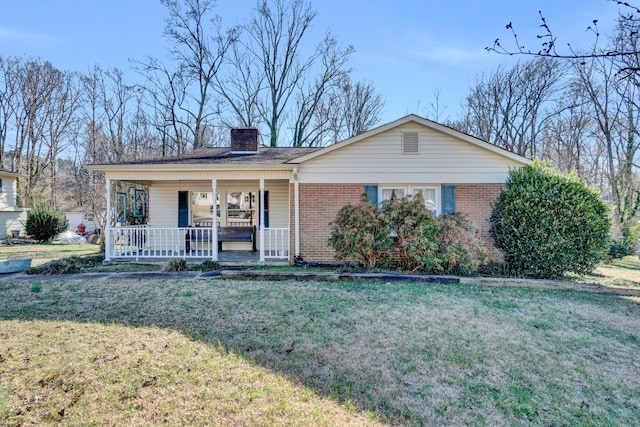 single story home featuring a front lawn and a porch