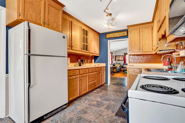 kitchen with sink and white appliances