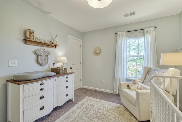 sitting room featuring light carpet