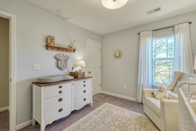 living area featuring light carpet